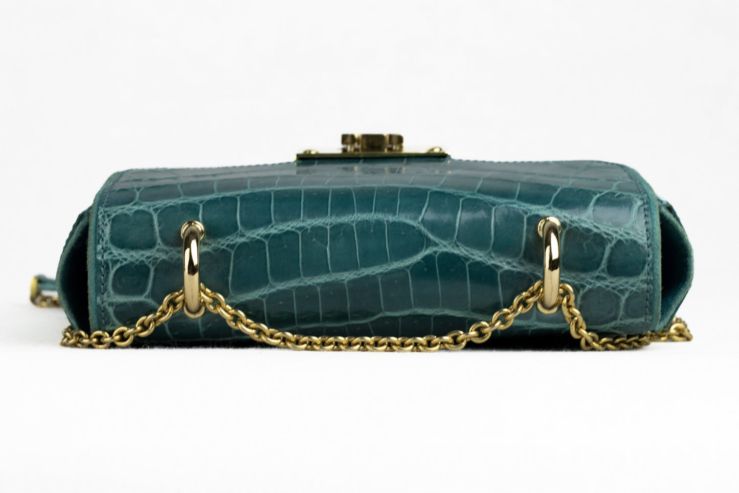 Dark emerald handbag made of genuine crocodile leather