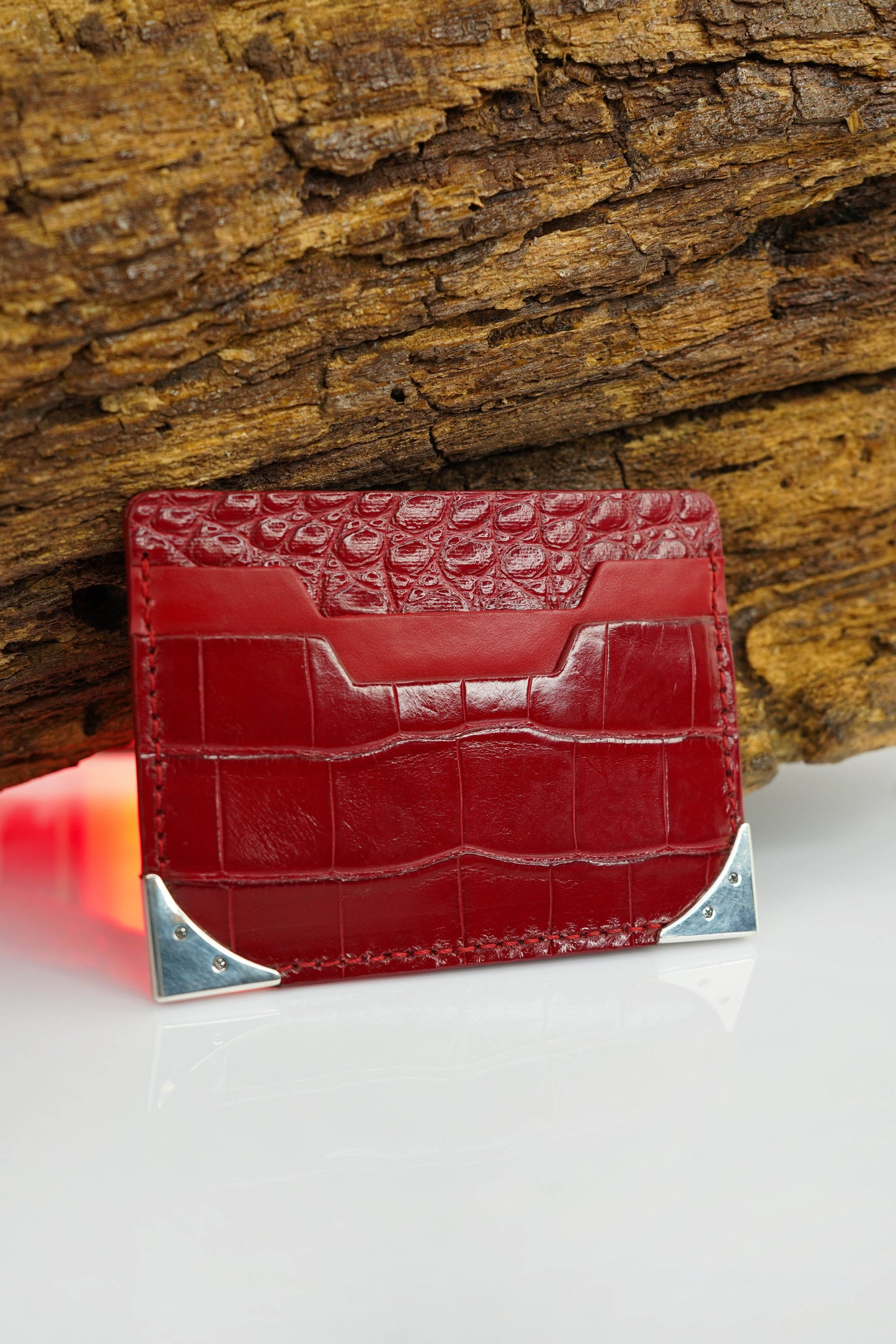 Cardholder made of crocodile leather with corners made of natural silver